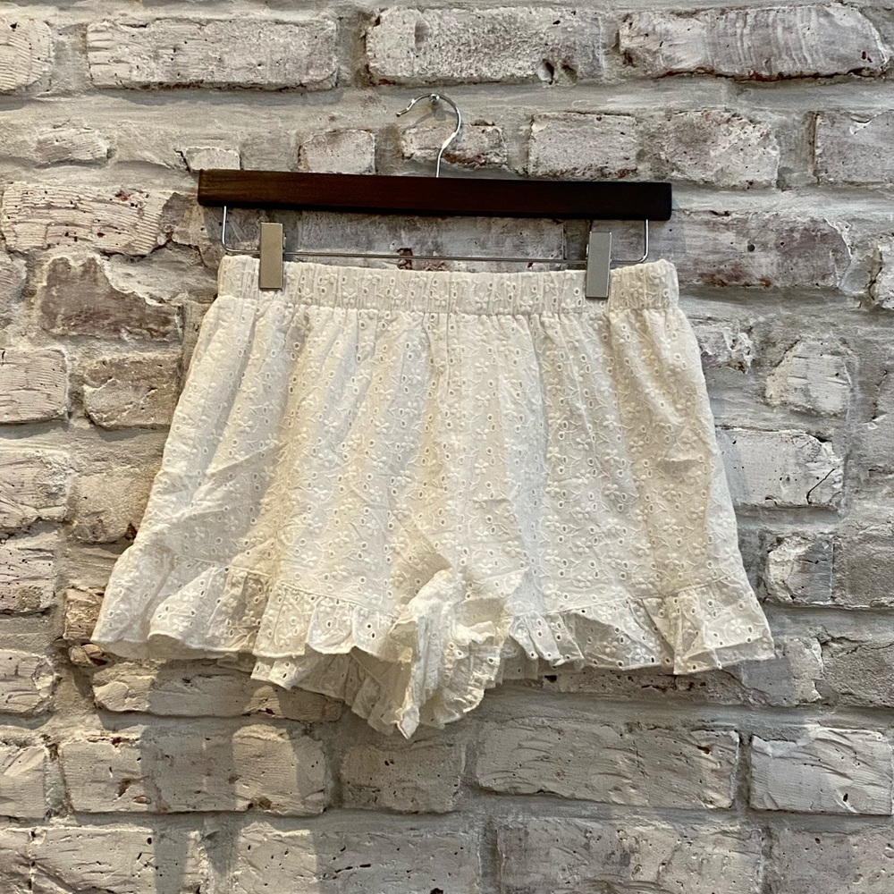 Super down white ruffle shorts